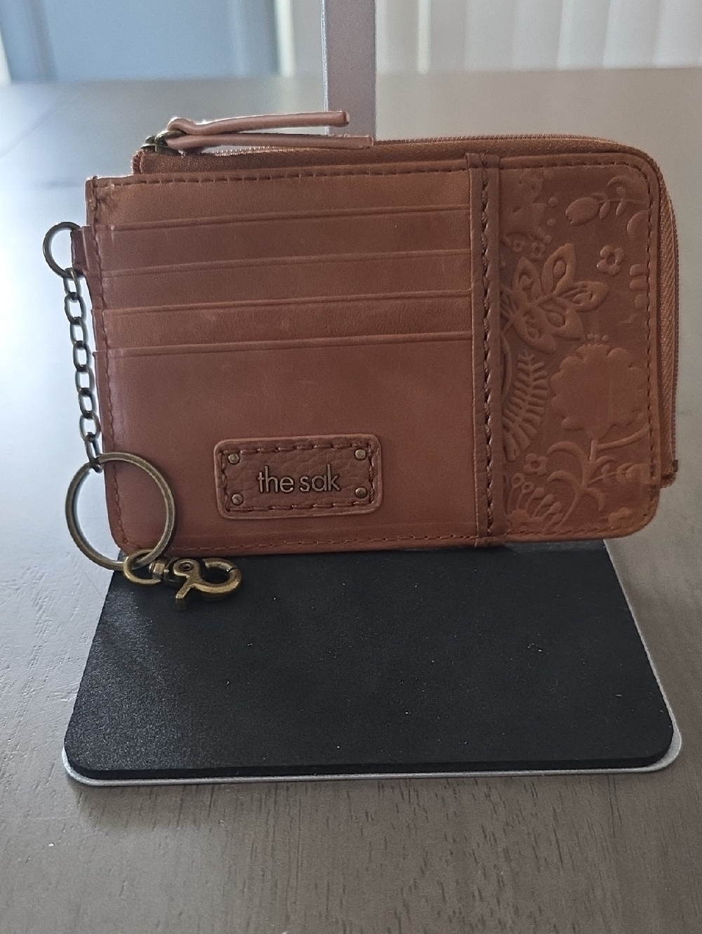 The Sak Iris Card Wallet in Tobacco Floral Embossed Leather